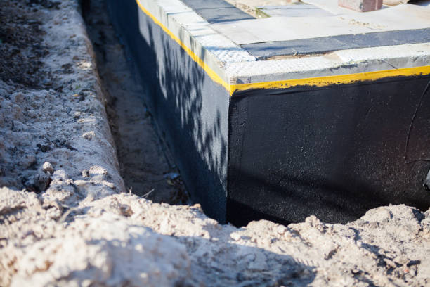 Professional Basement Waterproofing technician working in Chestnut Mound, TN